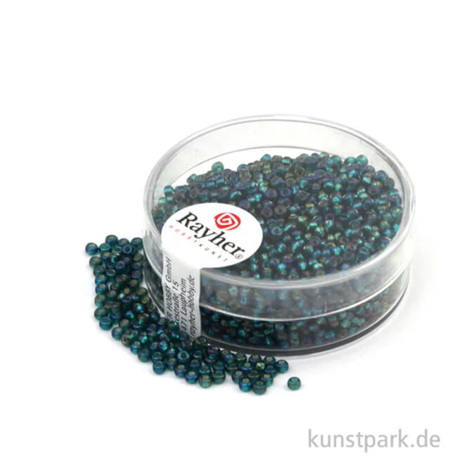 Artikelbild 1 des Artikels “Rocailles mit Silbereinzug & Rainbow - 2 mm - 17 g Dose | Smaragd“