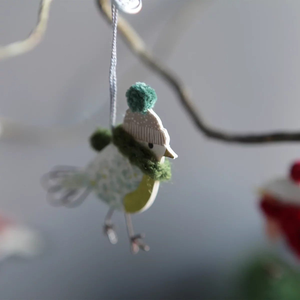 Artikelbild 2 des Artikels “Good old friends - Mini Wintervogel, Grüner Schal “