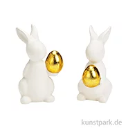 Artikelbild des Artikels “Hase mit Ei aus Keramik, Weiß, Sortiert, 7 x 11 x 6 cm “