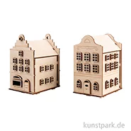 Artikelbild des Artikels “Holzbausatz Nordic Häuser, Natur, 11,8-12 cm, 85-tlg + Lichterketten “