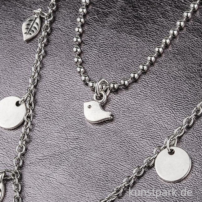 Artikelbild 2 des Artikels “Mini-Anhänger Metall - silberner Vogel, 6 Stück “